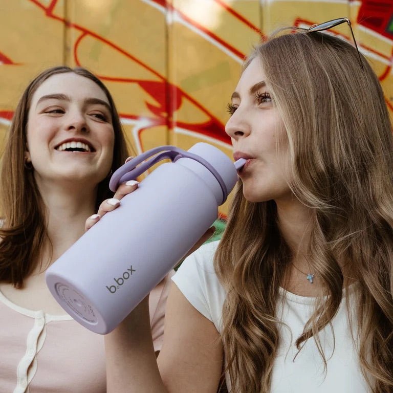 bbox flip top 1 litre insulated stainless steel drink bottle in purple lilac colour with teenager